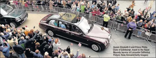  ??  ?? Queen Elizabeth II and Prince Philip, Duke of Edinburgh, travel to the Royal Maundy service at Leicester Cathedral Picture: Ross Kinnaird/Getty Images)