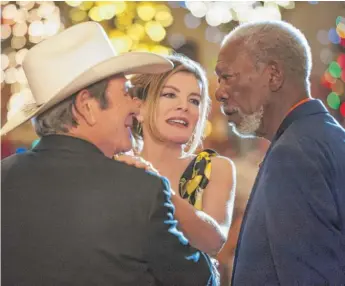  ?? | BROAD GREEN PICTURES ?? Suzie ( Rene Russo) becomes the object for affection for both Leo ( Tommy Lee Jones) and Duke ( Morgan Freeman) in “Just Getting Started.”