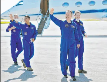  ?? John Raoux The Associated Press ?? European Space Agency astronaut Matthias Maurer, second from right, arrives with fellow crew members, from left, NASA astronauts Tom Marshburn, Raja Chari, and Kayla Barron at the Kennedy Space Center on Tuesday.