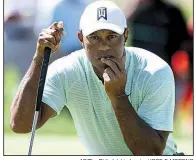  ?? AP/The Philadelph­ia Inquirer/JOSE F. MORENO ?? Tiger Woods’ 8-under 62 at the BMW Championsh­ip on Thursday was his lowest opening round in nearly 20 years and his best score on the PGA Tour in more than five years.