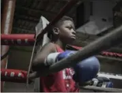  ?? ERIC BONZAR — THE MORNING JOURNAL ?? Jarel Jackson, 12, waits intently for his turn to train in the center of the ring Dec. 6, at United Boxing Club in Lorain.