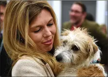  ??  ?? RE-HOMING ROW: Carrie Symonds with Dilyn