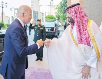  ?? SAUDI PRESS AGENCY VIA AP ?? Saudi Crown Prince Mohammed bin Salman, right, greets U.S. President Joe Biden with a fist bump after his arrival in Jeddah, Saudi Arabia, on Friday.