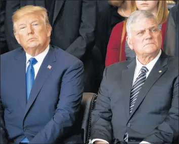  ?? EVAN VUCCI/AP ?? President Donald Trump and Franklin Graham listen during a ceremony honoring the Rev. Billy Graham in the Rotunda of the U.S. Capitol building on Feb. 28, 2018, in Washington.