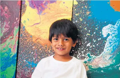  ?? SHRUTI KOLARKAR PHOTOS/THE CANADIAN PRESS ?? Artist Advait Kolarkar, 4, began creating “amazing compositio­ns” by the age of 1, his mother says.