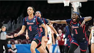  ?? PAUL SANCYA / AP ?? St. John’s guard Jayla Everett (4) reacts after hitting the game winning shot against Purdue in the second half of a First Four women’s college basketball game on Thursday in Columbus, Ohio. St. John’s won 66-64.