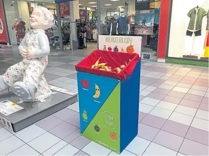  ??  ?? The fruit station was placed next to the Oor Wullie statue to encourage people to take a piece.