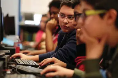  ??  ?? Chicago Public Schools has laid out one of the most ambitious plans in the nation to introduce students to coding.