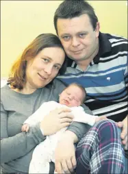  ?? Photo by John Cleary ?? ■ Baby Jack Houlihan, Tralee, was born at 29 minutes into New Year's Day at Kerry General Hospital, weighing 8lbs 8ozs. Jack is pictured with his parents, Kathleen and Dermot Houlihan, Tralee.