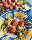  ?? GRETCHEN MCKAY PITTSBURGH POST-GAZETTE ?? A sheet pan dinner of meatballs and broccoli comes together in short time.