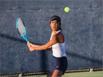  ?? Photo courtesy Jesse Munoz/COC Sports Informatio­n ?? Valencia alumnus Nicole Villarta is one of nine players on the COC tennis team that is local to the Santa Clarita Valley. The SCV talent has won nine of COC’s first 10 matches this season.