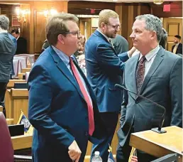  ?? TOM DAVIES/AP ?? Indiana House Minority Leader Phil GiaQuinta, D-Fort Wayne, left, talks with House Speaker Todd Huston, R-Fishers, before the start of the House session on Jan. 9, 2023, at the Statehouse in Indianapol­is.