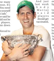  ?? ?? PRIZE GUY Djokovic after Australian success last year