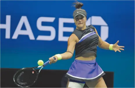  ?? AP PHOTO ?? Bianca Andreescu of Canada plays against Taylor Townsend of the United States during their fourth round match Monday.