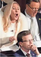  ?? JOSH MORGAN/USA TODAY ?? Rep. Marjorie Taylor Greene, R-Ga., yells as President Joe Biden gives his State of the Union address on Feb. 7.