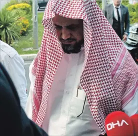  ?? THE ASSOCIATED PRESS ?? Saudi Arabia's top prosecutor Saud al-Mojeb walks to board a plane to leave Istanbul on Wednesday. A top Turkish prosecutor said Wednesday that Jamal Khashoggi was strangled as soon as he entered the consulate.