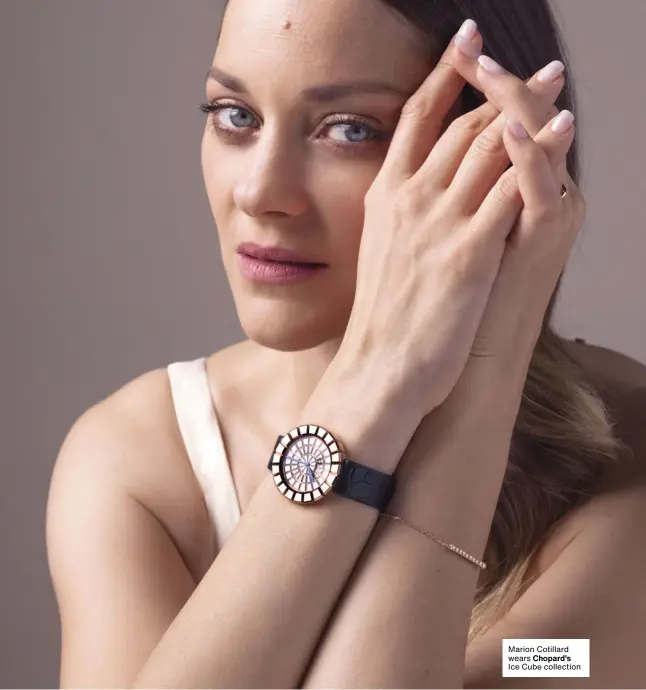  ??  ?? Marion Cotillard wears Chopard’s Ice Cube collection