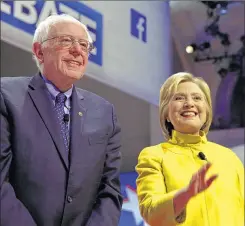  ?? / RWOOD @JOURNALSEN­TINEL.COM ?? Hillary Clinton and Bernie Sanders: One word (M-O-R-E).