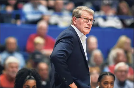  ?? Jessica Hill / AP ?? UConn coach Geno Auriemma during the first half of an NCAA women’s basketball game, last year in Hartford.