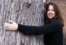  ?? MATTHEW HIGGINSON PHOTO ?? LEAF executive director Janet Mckay is a tree hugger who will help you find the perfect specimen for your own yard.