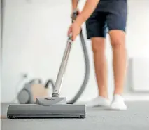  ?? ISTOCK ?? Vacuuming is more efficient than sweeping. A vacuum cleaner with strong suction will slash your cleaning time.