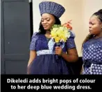  ?? ?? Dikeledi adds bright pops of colour to her deep blue wedding dress.