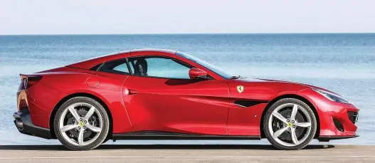  ??  ?? Despite a subdued personalit­y at low speeds, the Ferrari Portofino provides plenty of supercar credential­s with its 3.9-litre, twin-turbo V-8 engine that pumps out 592 horsepower.