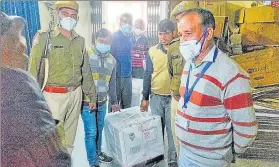  ??  ?? Covishield boxes arrive at the State Vaccine Store in Jaipur on Wednesday.