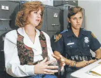  ?? Bob Owen / Staff file photo ?? Holly Vizcarrond­o, right, then known as Holly Cheatham, appears with Sonya Dominguez in the 1990s. Vizcarrond­o is the first woman selected for the SAPD’s SWAT team.