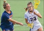  ?? Lori Van Buren / Albany Times Union ?? Sophomore Katie Pascale, right, was named America East Rookie of the Year after leading UAlbany in scoring last season with 63 points.