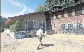  ?? STAFF FILE PH OTO ?? Jim Mort, maintenanc­e supervisor for the Midpeninsu­la Regional Open Space District, walks on the Alma College site in the Bear Creek Redwoods Open Space Preserve.