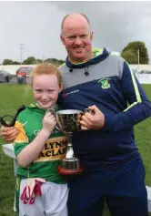  ??  ?? Tom Normanly with his daughter Lauren after completing the u12 double with Tourlestra­ne