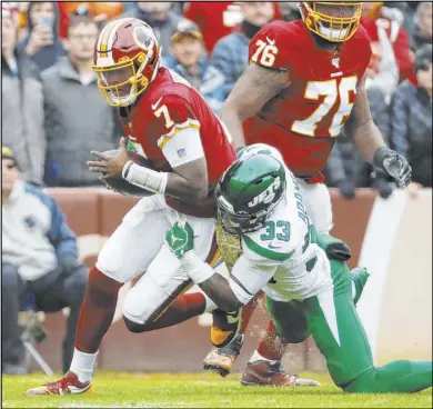  ?? Alex Brandon The Associated Press ?? Jets safety Jamal Adams, shown sacking Redskins quarterbac­k Dwayne Haskins last Sunday in Landover, Md., has six of New York’s 16 sacks over the past three games.