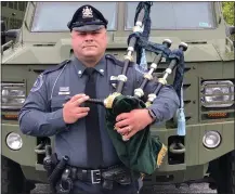  ??  ?? Officer Ryan Barr, a member of the Pipe Band, helped to organize the tribute to local first responders.