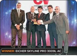  ??  ?? WINNER: EICHER SKYLINE PRO 3009L AC (L to R): Kaushik Madhavan, Director – Automotive & Transporta­tion, Frost & Sullivan; Shyam Maller, EVP – Sales, Marketing and Aftermarke­t (LMD & Buses), VE Commercial Vehicles; B Srinivas, SVP – Strategy & Product...