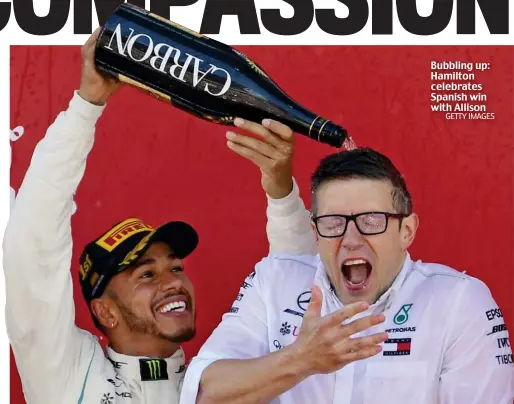  ?? GETTY IMAGES ?? Bubbling up: Hamilton celebrates Spanish win with Allison