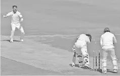  ??  ?? New Zealand batsman Ross Taylor (2R) is bowled out by Pakistani spinner Yasir Shah (L) during the first day of the third and final Test match between Pakistan and New Zealand at the Sheikh Zayed Internatio­nal Cricket Stadium in Abu Dhabi. - AFP photo