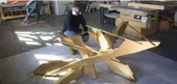  ?? TODD KOROL/TORONTO STAR ?? Graffiti artist and sculptor Kwest, pictured in his west-end studio, poses near the base of a ping-pong table — a birthday gift commission­ed for Drake.