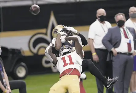  ?? Brett Duke / Associated Press ?? New Orleans cornerback Janoris Jenkins breaks up a pass intended for 49ers wide receiver Brandon Aiyuk ( 11).