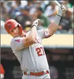  ?? Paul Chinn / San Francisco Chronicle ?? Mike Trout of the Angels warms up before batting against the Athletics in 2019.