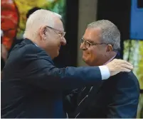  ?? (Mark Neyman/GPO) ?? PRESIDENT REUVEN RIVLIN embraces Organizati­on of Victims of Terrorism chairman Abie Moses yesterday at the President’s Residence.