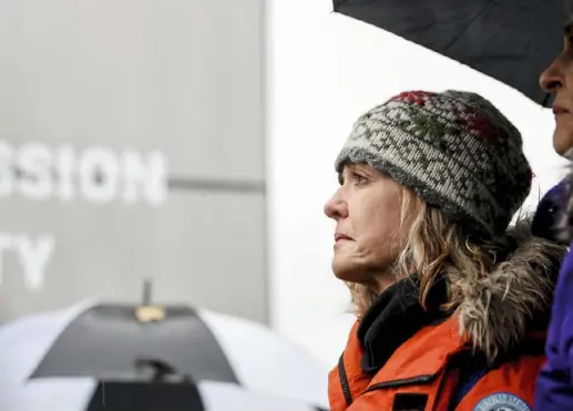  ??  ?? Above: Sally Wiggin becomes emotional during a performanc­e at the Rally for Peace and Tree of Life Victims on Nov. 9. (Alexandra Wimley/Post-Gazette)