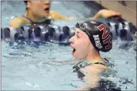  ?? Dave Phillips / For Hearst Connecticu­t Media ?? North Haven’s Maddie Bergin reacts after winning the 100 freestyle during a meet in 2017.