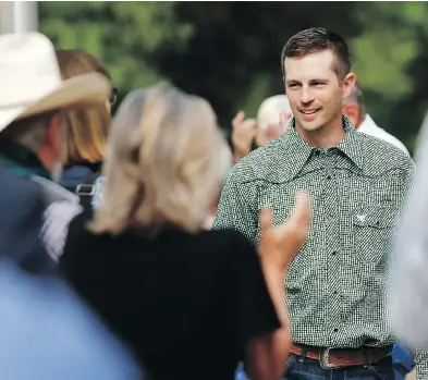  ?? LEAH HENNEL / POSTMEDIA ?? Edouard Maurice was all smiles outside provincial court in Okotoks, Alta., in June when charges were dropped.