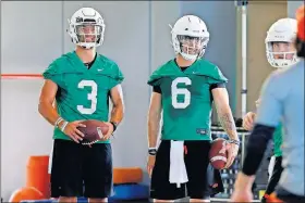  ?? TERRY/THE OKLAHOMAN] ?? Oklahoma State's Spencer Sanders, left, and Dru Brown continue to compete for the starting quarterbac­k job. [BRYAN