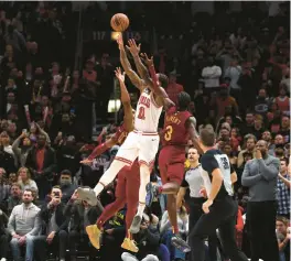  ?? STACEY WESCOTT/CHICAGO TRIBUNE ?? DeMar DeRozan goes up for a shot with just seconds left in the fourth quarter against the Cleveland Cavaliers on Saturday.