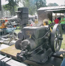  ??  ?? Forgive the gas engine! The Y-V starts with compressed air and the Tri-state gang uses a vintage F-M Model Z , 2-hp engine with a F-M Type E direct-driven, single-cylinder air compressor to supply air pressure. Many big Fairbanks engines are seen with an accompanyi­ng F-M compressor setup. F-M developed their own compressor­s in 1921, and this one has a 3 x 3.5 inch bore and stroke and could generate up to 250 psi.