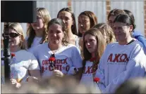  ?? JOSHUA L. JONES - VIA THE ASSOCIATED PRESS ?? Alpha Chi Omega members mourn the loss of their sorority sister, Laken Riley, during a vigil for the Augusta University College of Nursing student on the University of Georgia campus in Athens on Monday.