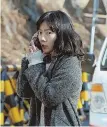  ??  ?? TRAPPED: Jung-soo (Jungwoo Ha, left) is stuck in `The Tunnel' in his car. He calls his wife, Se-hyun (Doona Bae, above), while waiting to be rescued.