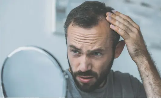  ?? PHOTOS: GETTY IMAGES/ISTOCKPHOT­O ?? For many men, hair loss can be a traumatic, all-consuming experience. However, the sooner they tackle the problem, the better the results.